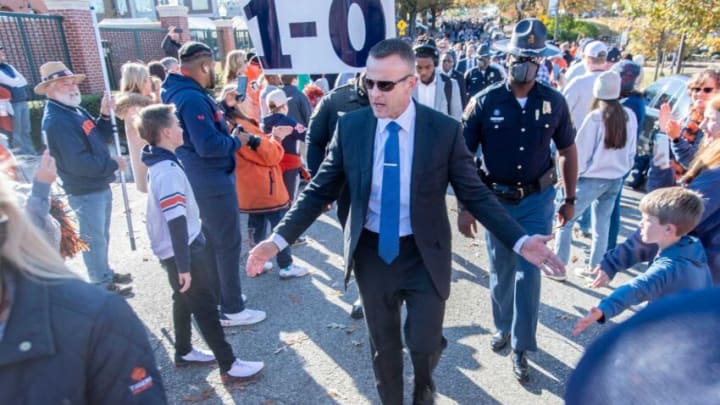 Auburn football head coach Bryan Harsin greets fans at tiger walk at Jordan-Hare Stadium in Auburn, Ala., on Saturday, Nov. 13, 2021.