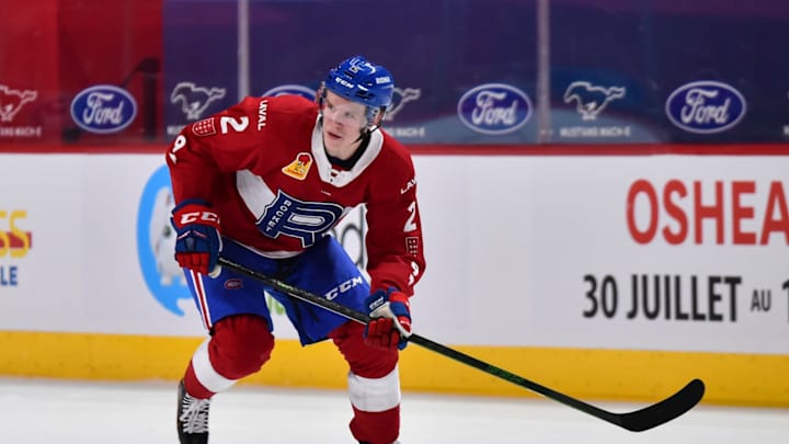 MONTREAL, QC – FEBRUARY 22: Kaiden Guhle #2 of the Laval Rocket skates against the Manitoba Moose in his first career AHL game during the second period at the Bell Centre on February 22, 2021 in Montreal, Canada. The Manitoba Moose defeated the Laval Rocket 3-2 in overtime. (Photo by Minas Panagiotakis/Getty Images)