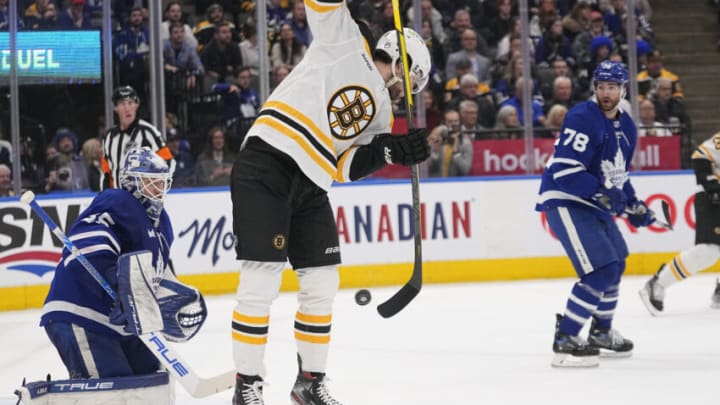 Feb 1, 2023; Toronto, Ontario, CAN; Boston Bruins forward Pavel Zacha (18) deflects a puck in front of Toronto Maple Leafs goaltender Ilya Samsonov (35) during the second period at Scotiabank Arena. Mandatory Credit: John E. Sokolowski-USA TODAY Sports