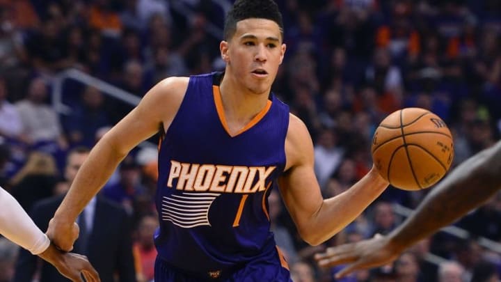 Oct 26, 2016; Phoenix, AZ, USA; Phoenix Suns guard Devin Booker #1 makes a pass against the Sacramento Kings during the first half at Talking Stick Resort Arena. Mandatory Credit: Jennifer Stewart-USA TODAY Sports