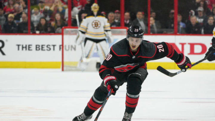 RALEIGH, NC - MAY 14: Carolina Hurricanes center Sebastian Aho (20) skates after a loose puck during a game between the Boston Bruins and the Carolina Hurricanes on May 14, 2019 at the PNC Arena in Raleigh, NC. (Photo by Greg Thompson/Icon Sportswire via Getty Images)
