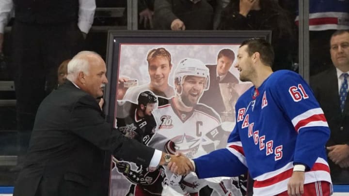 NEW YORK, NY - NOVEMBER 06: Prior to the game between the New York Rangers and the Columbus Blue Jackets, Rick Nash #61 of the New York Rangers was honored for playing in his 1000th NHL game and is joined by John Davidson of the Blue Jackets (l) at Madison Square Garden on November 6, 2017 in New York City. (Photo by Bruce Bennett/Getty Images)