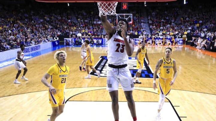 DES MOINES, IOWA - MARCH 21: Steven Enoch #23 of the Louisville Cardinals dunks the ball against the Minnesota Golden Gophers during their game in the First Round of the NCAA Basketball Tournament at Wells Fargo Arena on March 21, 2019 in Des Moines, Iowa. (Photo by Andy Lyons/Getty Images)