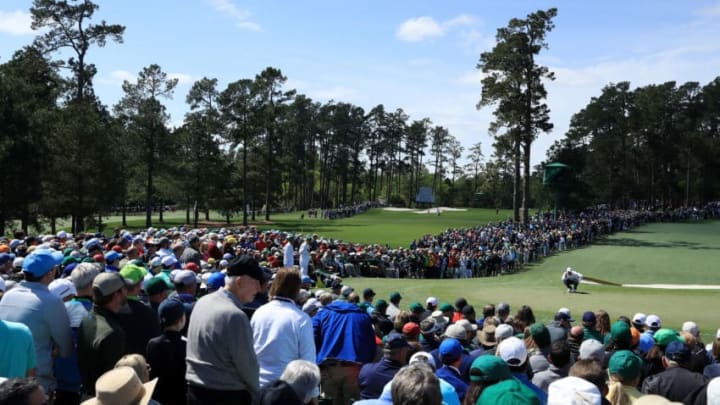AUGUSTA, GA - APRIL 08: Patrons watch as Rory McIlroy of Northern Ireland lines up a putt on the second green during the final round of the 2018 Masters Tournament at Augusta National Golf Club on April 8, 2018 in Augusta, Georgia. (Photo by Andrew Redington/Getty Images)