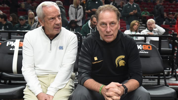 PORTLAND, OR – NOVEMBER 26: North Carolina Tar Heels head coach Roy Williams and Michigan State Spartans head coach Tom Izzo speak before the game between the Michigan State Spartans and the North Carolina Tar Heels during the PK80-Phil Knight Invitational presented by State Farm at the Moda Center on November 26, 2017 in Portland, Oregon. Photo by Steve Dykes/Getty Images)