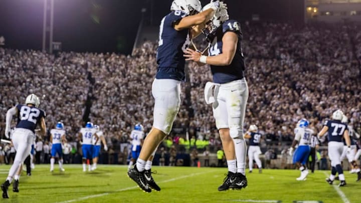 STATE COLLEGE, PA - SEPTEMBER 07: Pat Freiermuth #87 of the Penn State Nittany Lions celebrates with Sean Clifford #14 after catching a pass for a touchdown against the Buffalo Bulls during the second half at Beaver Stadium on September 07, 2019 in State College, Pennsylvania. (Photo by Scott Taetsch/Getty Images)