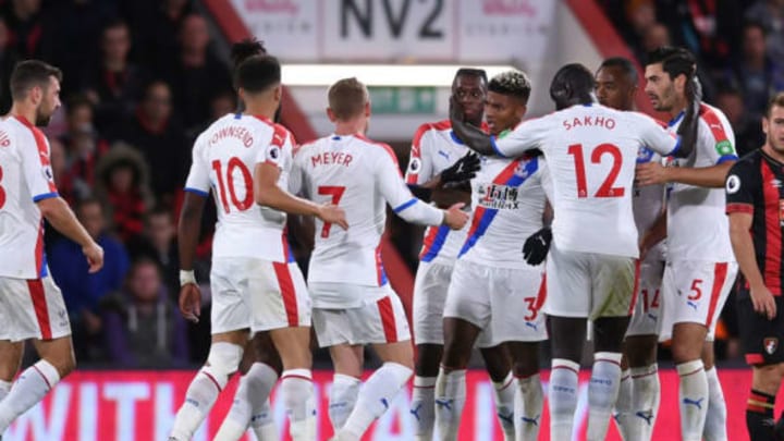 1st October 2018, Vitality Stadium, Bournemouth, England; EPL Premier League football, Bournemouth versus Crystal Palace; teammates celebrate with Patrick van Aanholt of Crystal Palace after scoring their first goal in the 55th minute 1-1 (photo by Simon West/Action Plus via Getty Images)