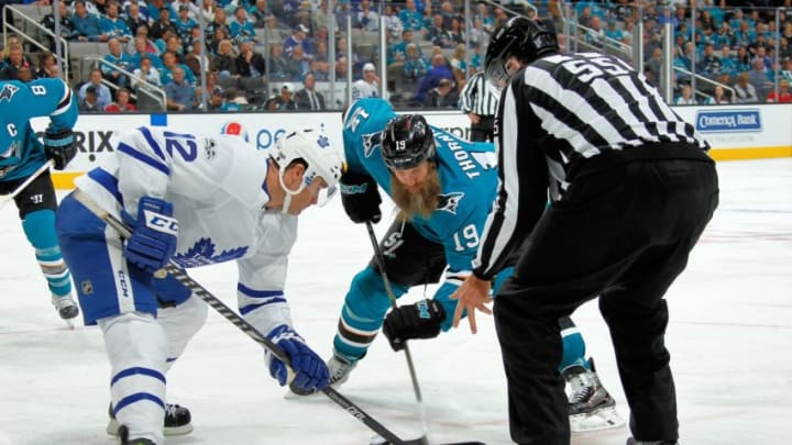 SAN JOSE, CA – OCTOBER 30: Joe Thornton #19 of the San Jose Sharks and Patrick Marleau #12 of the Toronto Maple Leafs faceoff at SAP Center on October 30, 2017 in San Jose, California. (Photo by Don Smith/NHLI via Getty Images)