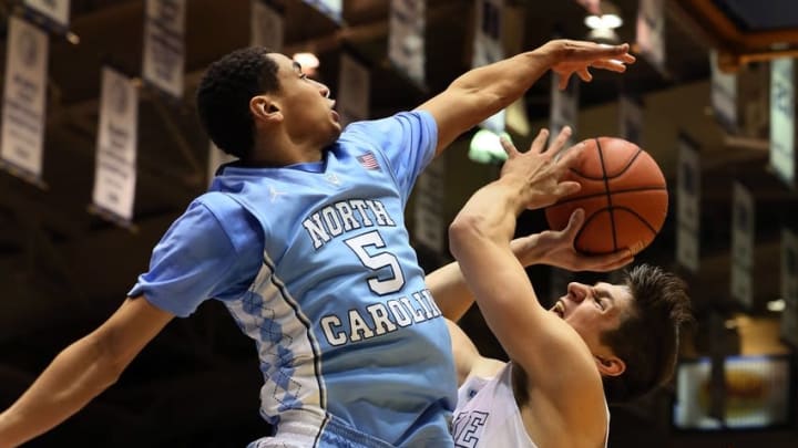 Mar 5, 2016; Durham, NC, USA; Duke Blue Devils guard Grayson Allen (3) drives against North Carolina Tar Heels guard Marcus Paige (5) in the second half of their game at Cameron Indoor Stadium. Mandatory Credit: Mark Dolejs-USA TODAY Sports