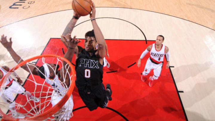 PORTLAND, OR – APRIL 1: Marquese Chriss #0 of the Phoenix Suns dunks the ball during the game against the Portland Trail Blazers on April 1, 2017 at the Moda Center in Portland, Oregon. NOTE TO USER: User expressly acknowledges and agrees that, by downloading and or using this Photograph, user is consenting to the terms and conditions of the Getty Images License Agreement. Mandatory Copyright Notice: Copyright 2017 NBAE (Photo by Sam Forencich/NBAE via Getty Images)