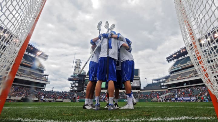 PHILADELPHIA, PA - MAY 25: The Duke University Blue Devils huddle before the game against the Cornell University Big Red during a semifinal game of the 2013 NCAA Division I Men's Lacrosse Championships at Lincoln Financial Field on May 25, 2013 in Philadelphia, Pennsylvania. Duke won 16-14. (Photo by Drew Hallowell/Getty Images)