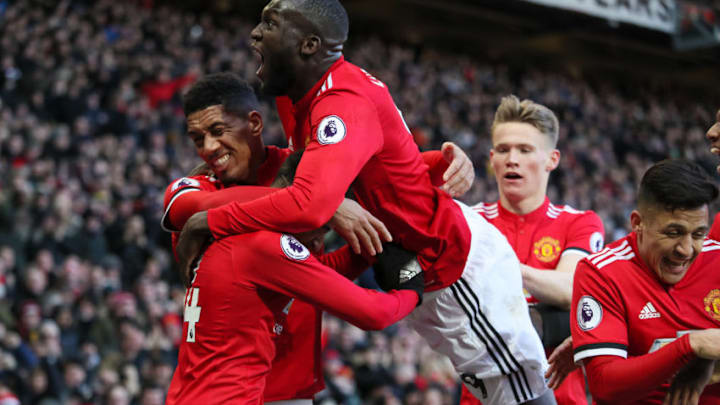 MANCHESTER, ENGLAND - FEBRUARY 25: Jesse Lingard of Manchester United celebrates after scoring a goal to make it 2-1 during the Premier League match between Manchester United and Chelsea at Old Trafford on February 25, 2018 in Manchester, England. (Photo by Matthew Ashton - AMA/Getty Images)