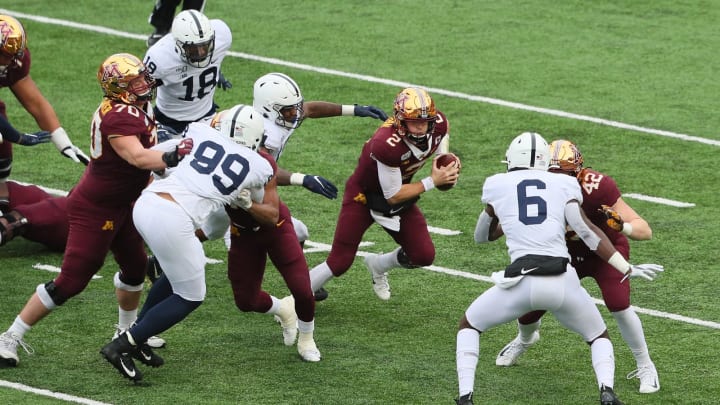 MINNEAPOLIS, MN – NOVEMBER 09: Tanner Morgan #2 of the Minnesota Golden Gophers scrambles with the ball in the fourth quarter agains the Penn State Nittany Lions at TCFBank Stadium on November 9, 2019 in Minneapolis, Minnesota. The Minnesota Golden Gophers defeated the Penn State Nittany Lions 31-26 to remain undefeated.(Photo by Adam Bettcher/Getty Images)