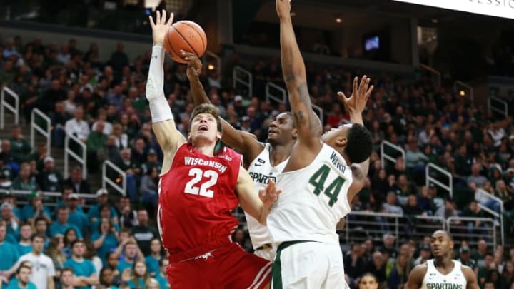 EAST LANSING, MI - JANUARY 26: Jaren Jackson Jr. #2 of the Michigan State Spartans blocks the shot of Ethan Happ #22 of the Wisconsin Badgers in the second half at Breslin Center on January 26, 2018 in East Lansing, Michigan. (Photo by Rey Del Rio/Getty Images)