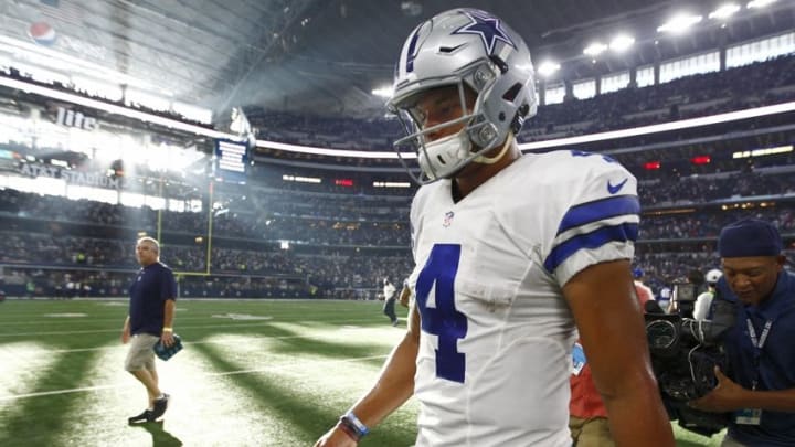 Sep 11, 2016; Arlington, TX, USA; Dallas Cowboys quarterback Dak Prescott (4) leaves the field after losing to the New York Giants 20-19 at AT&T Stadium. Giants 20, Cowboys 19. Mandatory Credit: Erich Schlegel-USA TODAY Sports