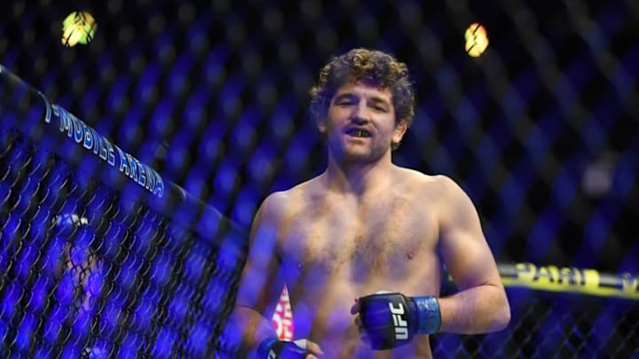 Mar 2, 2019; Las Vegas, NV, USA; Robbie Lawler (red gloves) and Ben Askren (blue gloves) during UFC 235 at T-Mobile Arena. Mandatory Credit: Stephen R. Sylvanie-USA TODAY Sports