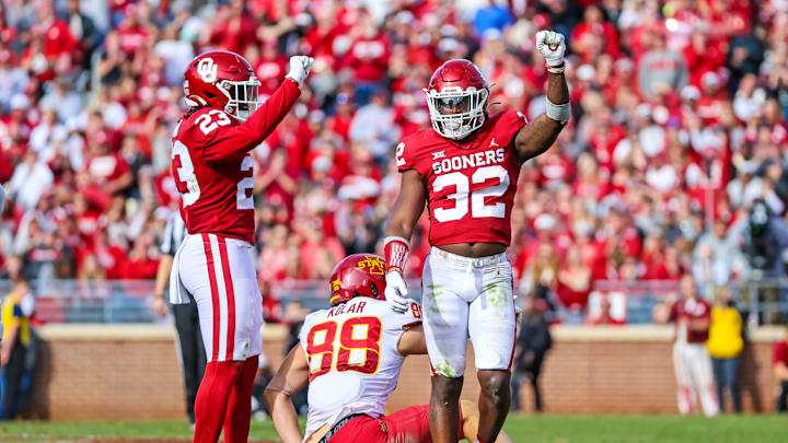 Nov 20, 2021; Norman, Oklahoma, USA; Oklahoma Sooners safety Delarrin Turner-Yell (32) and linebacker DaShaun White (23) react during the second half in front of Iowa State Cyclones tight end Charlie Kolar (88) at Gaylord Family-Oklahoma Memorial Stadium. Mandatory Credit: Kevin Jairaj-USA TODAY Sports