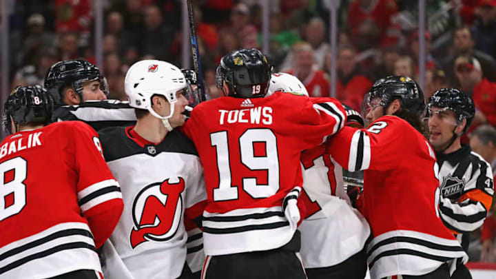 CHICAGO, ILLINOIS - DECEMBER 23: An altercation breaks out between the Chicago Blackhawks and the New Jersey Devils at the United Center on December 23, 2019 in Chicago, Illinois. (Photo by Jonathan Daniel/Getty Images)