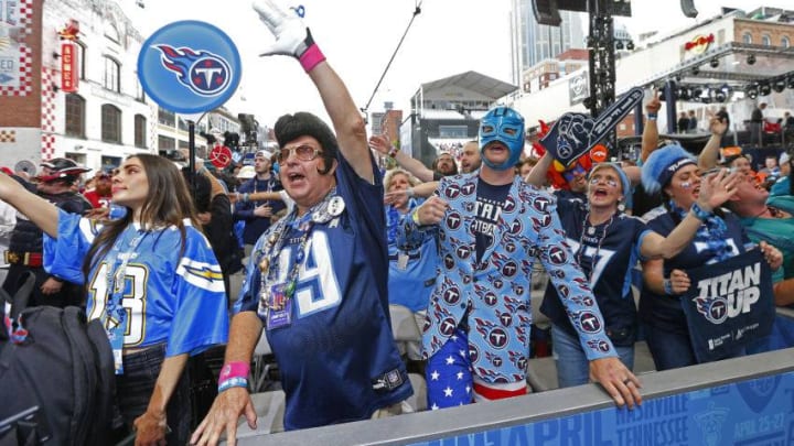 NASHVILLE, TENNESSEE - APRIL 25: Fans of the Tennessee Titans attend Day 1 of the 2019 NFL Draft on April 25, 2019 in Nashville, Tennessee. (Photo by Frederick Breedon/Getty Images)