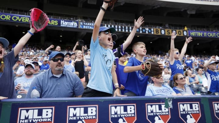 Several young fans plead for a baseball in between innings during game one of a doubleheader between the Kansas City Royals and New York Yankees at Kauffman Stadium on May 25, 2019 in Kansas City, Missouri. The Yankees won 7-3. (Photo by Joe Robbins/Getty Images)
