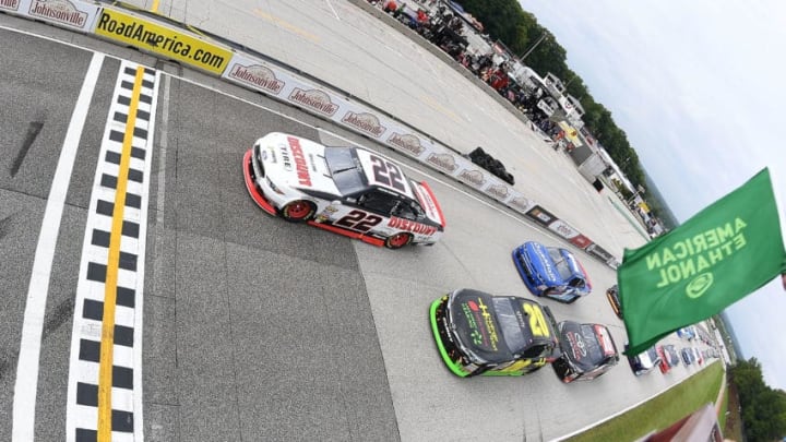 ELKHART LAKE, WI - AUGUST 27: Austin Cindric, driver of the #22 Discount Tire Ford, takes the green flag to start the NASCAR XFINITY Series Johnsonville 180 at Road America on August 27, 2017 in Elkhart Lake, Wisconsin. (Photo by Stacy Revere/Getty Images)