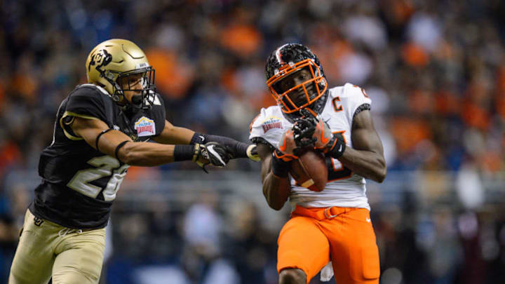 SAN ANTONIO, TX – DECEMBER 29: Oklahoma State Cowboys wide receiver James Washington (28) hauls in a pass during the Valero Alamo Bowl between the Colorado Buffaloes and Oklahoma State Cowboys on December 29, 2016, at the Alamodome in San Antonio, TX. (Photo by Daniel Dunn/Icon Sportswire via Getty Images)