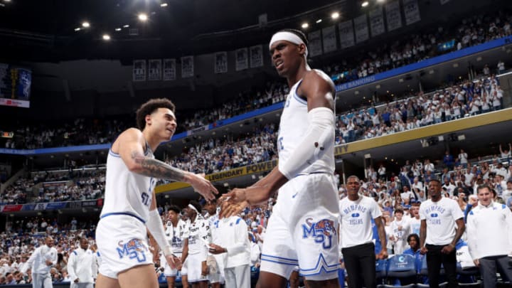 MEMPHIS, TN - MARCH 6: Lester Quinones #11 and Jalen Duren #2 of the Memphis Tigers celebrate against the Houston Cougars during a game on March 6, 2022 at FedExForum in Memphis, Tennessee. Memphis defeated Houston 75-61. (Photo by Joe Murphy/Getty Images)