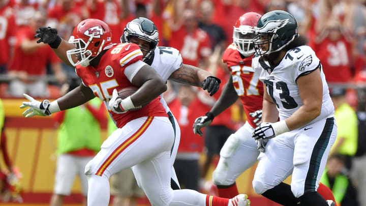 Kansas City Chiefs defensive end Chris Jones runs with an intercepted pass (John Sleezer/Kansas City Star/TNS via Getty Images)