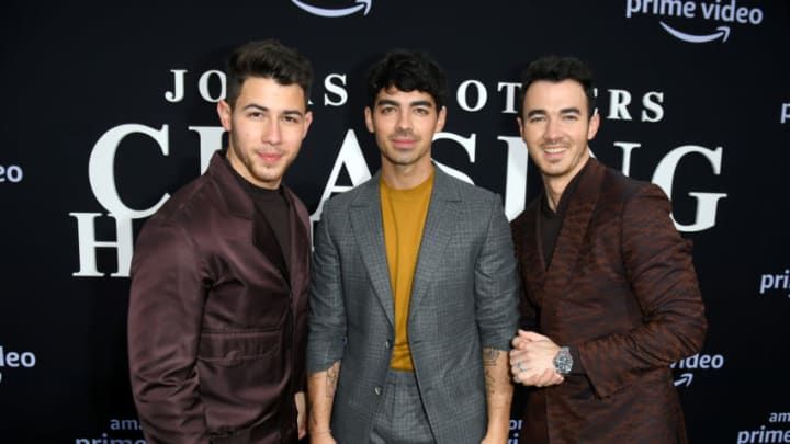 LOS ANGELES, CALIFORNIA - JUNE 03: Nick Jonas, Joe Jonas, and Kevin Jonas attend the Premiere of Amazon Prime Video's 'Chasing Happiness' at Regency Bruin Theatre on June 03, 2019 in Los Angeles, California. (Photo by Kevin Winter/Getty Images)