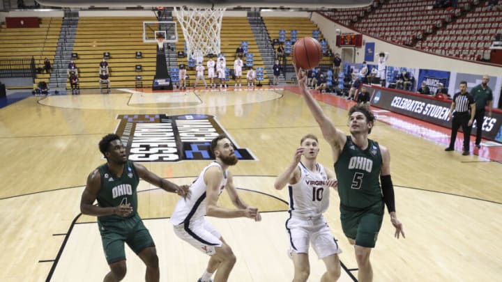 BLOOMINGTON, INDIANA - MARCH 20: Ben Vander Plas #5 of the Ohio Bobcats shoots in front of Sam Hauser #10 of the Virginia Cavaliers in the first round game of the 2021 NCAA Men's Basketball Tournament at Assembly Hall on March 20, 2021 in Bloomington, Indiana. (Photo by Stacy Revere/Getty Images)