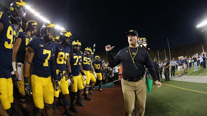 ANN ARBOR, MI - OCTOBER 07: Michigan head football coach Jim Harbaugh watches the warms ups prior to the start of the game against the Michigan State Spartans at Michigan Stadium on October 7, 2017 in Ann Arbor, Michigan. Michigan State defeated Michigan 14-10. (Photo by Leon Halip/Getty Images)