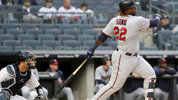 NEW YORK, NY - APRIL 25: Miguel Sano #22 of the Minnesota Twins hits a two run home run in the first inniing as Austin Romine #28 of the New York Yankees defends at Yankee Stadium on April 25, 2018 in the Bronx borough of New York City. (Photo by Elsa/Getty Images)