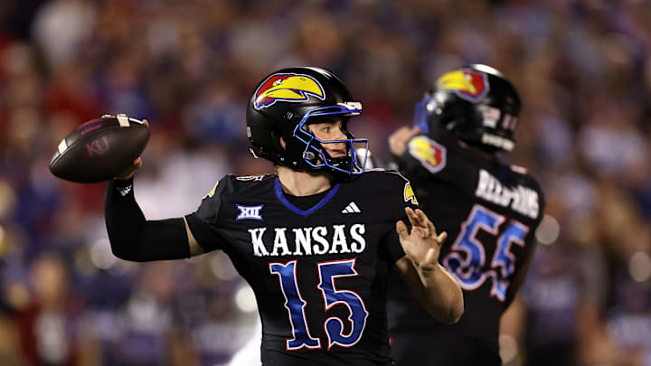 LAWRENCE, KANSAS – NOVEMBER 18: Quarterback Cole Ballard #15 of the Kansas Jayhawks passes during the 1st half of the game against the Kansas State Wildcats at David Booth Kansas Memorial Stadium on November 18, 2023 in Lawrence, Kansas. (Photo by Jamie Squire/Getty Images)