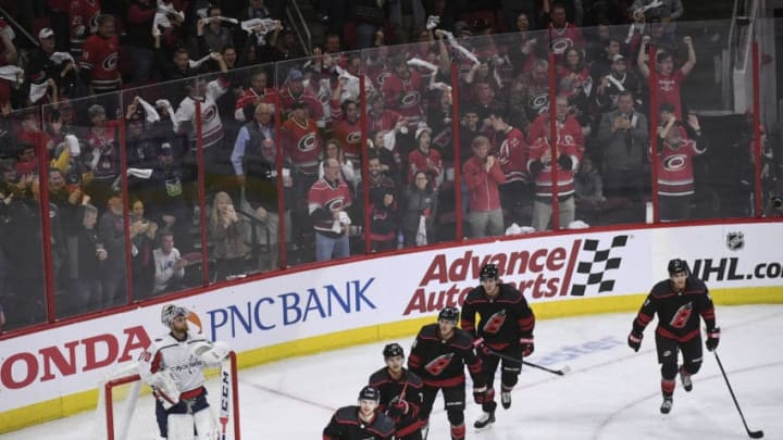 RALEIGH, NC - APRIL 15:The Carolina Hurricanes skate back to the bench after a goal by Carolina Hurricanes left wing Warren Foegele (13) during the second period of the third game of the first round of the Stanley Cup Playoffs between the Washington Capitals and the Carolina Hurricanes on Monday, April 15, 2019. (Photo by Toni L. Sandys/The Washington Post via Getty Images)