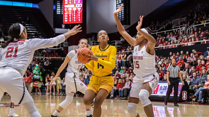 PALO ALTO, CA – FEBRUARY 02: California Golden Bears guard Kianna Smith (14) works toward the rim between Stanford Cardinal guard DiJonai Carrington (21) and Stanford Cardinal forward Maya Dodson (15) during the game between the California Golden Bears and the Stanford Cardinal on Saturday, February 2, 2019 at Maples Pavilion in Palo Alto, California. (Photo by Douglas Stringer/Icon Sportswire via Getty Images)