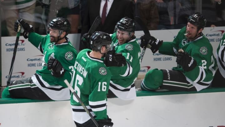 Apr 7, 2016; Dallas, TX, USA; Dallas Stars rookie center Jason Dickinson (16) celebrates with the bench after scoring his first NHL goal against the Colorado Avalanche during the first period at the American Airlines Center. Mandatory Credit: Jerome Miron-USA TODAY Sports