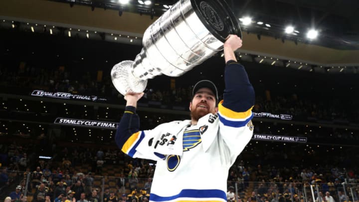 BOSTON, MASSACHUSETTS - JUNE 12: Zach Sanford #12 of the St. Louis Blues hoists the Stanley Cup on the ice after the 2019 NHL Stanley Cup Final at TD Garden on June 12, 2019 in Boston, Massachusetts. The St. Louis Blues defeated the Boston Bruins 4-1 in Game 7 to win the Stanley Cup Final 4-3. (Photo by Dave Sandford/NHLI via Getty Images)