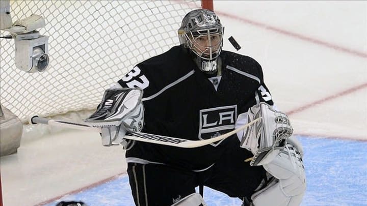 May 23, 2013; Los Angeles, CA, USA; Los Angeles Kings goalie Jonathan Quick (32) makes a save in the second period of game five of the second round of the 2013 Stanley Cup Playoffs against the San Jose Sharks at the Staples Center. Mandatory Credit: Jayne Kamin-Oncea-USA TODAY Sports