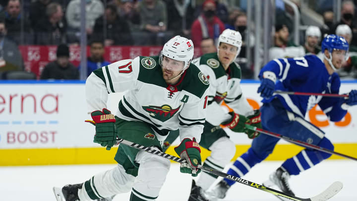 Feb 24, 2022; Toronto, Ontario, CAN; Minnesota Wild forward Marcus Foligno (17) skates against the Toronto Maple Leafs during the second period at Scotiabank Arena. Mandatory Credit: John E. Sokolowski-USA TODAY Sports