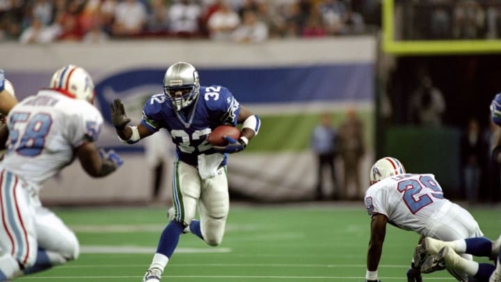 29 Nov 1998: Running back Ricky Watters #32 of the Seattle Seahawks in action during a game against the Tennessee Oilers at the Kingdome in Seattle, Washington. The Seahawks defeated the Oilers 20-18. Mandatory Credit: Otto Greule Jr. /Allsport