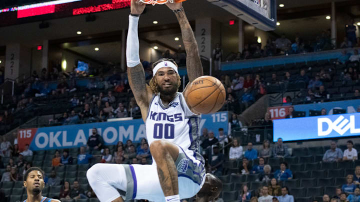 OKLAHOMA CITY, OK – OCTOBER 21: Willie Cauley-Stein #00 of the Sacramento Kings dunks two points against the Oklahoma City Thunder during the second half of a NBA game at the Chesapeake Energy Arena on October 21, 2018 in Oklahoma City, Oklahoma. NOTE TO USER: User expressly acknowledges and agrees that, by downloading and or using this photograph, User is consenting to the terms and conditions of the Getty Images License Agreement. (Photo by J Pat Carter/Getty Images)