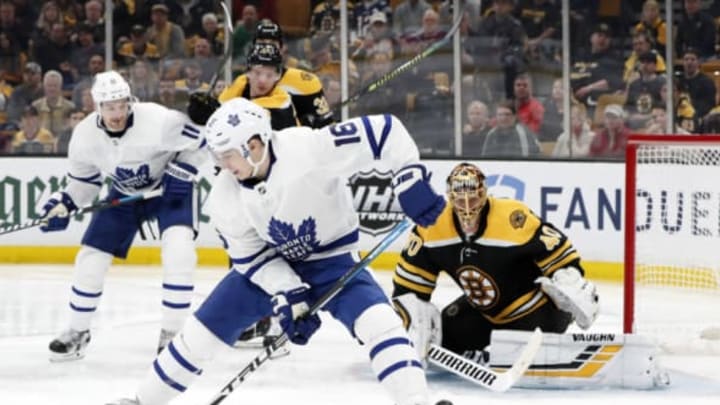 BOSTON, MA – APRIL 23: Toronto Maple Leafs right wing Mitchell Marner (16) misses the tip but Boston Bruins goalie Tuukka Rask (40) keeps track of the puck during Game 7 of the 2019 First Round Stanley Cup Playoffs between the Boston Bruins and the Toronto Maple Leafs on April 23, 2019, at TD Garden in Boston, Massachusetts. (Photo by Fred Kfoury III/Icon Sportswire via Getty Images)