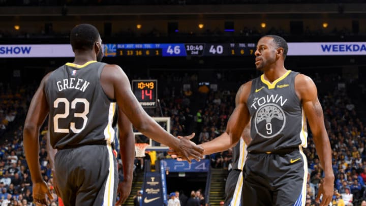 OAKLAND, CA - OCTOBER 31: Draymond Green #23 and Andre Iguodala #9 of the Golden State Warriors high five during the game against the New Orleans Pelicans on October 31, 2018 at ORACLE Arena in Oakland, California. NOTE TO USER: User expressly acknowledges and agrees that, by downloading and/or using this photograph, user is consenting to the terms and conditions of Getty Images License Agreement. Mandatory Copyright Notice: Copyright 2018 NBAE (Photo by Noah Graham/NBAE via Getty Images)