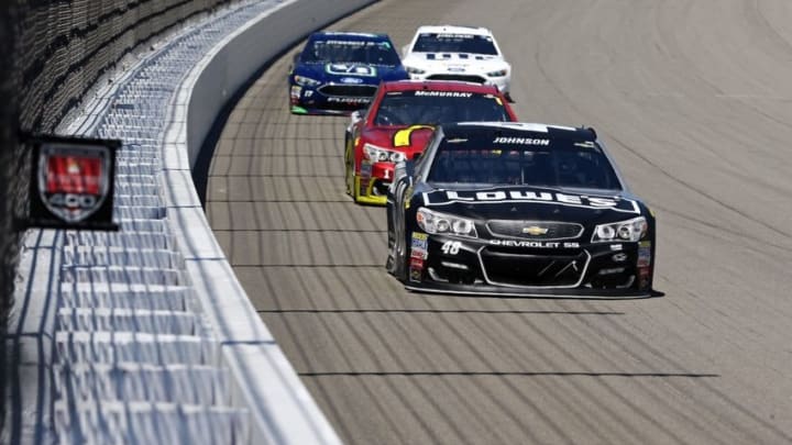 Jun 12, 2016; Brooklyn, MI, USA; Sprint Cup Series driver Jimmie Johnson (48) races during the FireKeepers Casino 400 at Michigan International Speedway. Mandatory Credit: Aaron Doster-USA TODAY Sports