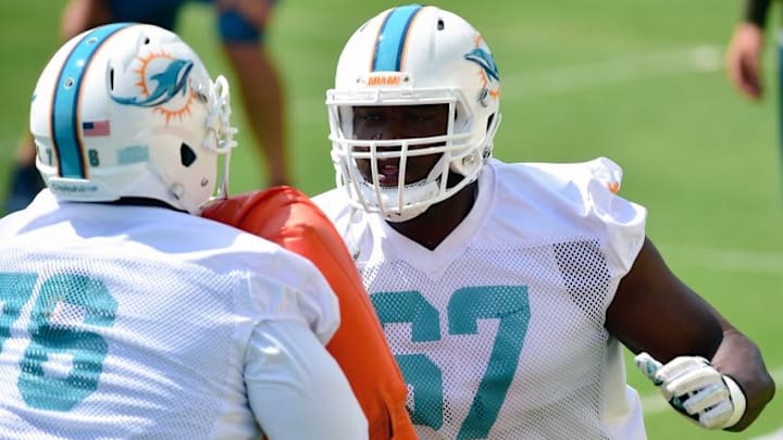Jun 14, 2016; Miami Gardens, FL, USA; Miami Dolphins offensive lineman Laremy Tunsil (right) blocks Dolphins offensive tackle Branden Albert (left) during practice drills at Baptist Health Training Facility at Nova South. Mandatory Credit: Steve Mitchell-USA TODAY Sports Jun 14, 2016; Miami Gardens, FL, USA; Miami Dolphins offensive lineman Laremy Tunsil (right) blocks Dolphins offensive tackle Branden Albert (left) during practice drills at Baptist Health Training Facility at Nova South. Mandatory Credit: Steve Mitchell-USA TODAY Sports