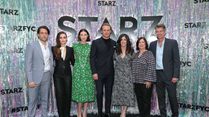 CENTURY CITY, CALIFORNIA - JUNE 02: (L-R) Richard Rankin, Sophie Skelton, Caitriona Balfe, Sam Heughan, Executive Producer Maril Davis, Executive Producer/Writer Toni Graphia and Production Designer Jon Gary Steele attend Starz FYC 2019 — Where Creativity, Culture and Conversations Collide on June 02, 2019 at Westfield Century City in Century City, California. (Photo by Rich Polk/Getty Images for STARZ Entertainment LLC.)