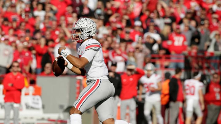 Ohio State Buckeyes quarterback C.J. Stroud (7) carries the ball while looking for an open man during Saturday’s NCAA Division I football game against the Nebraska Cornhuskers in Lincoln, Neb., on November 6, 2021.Osu21neb Bjp 327