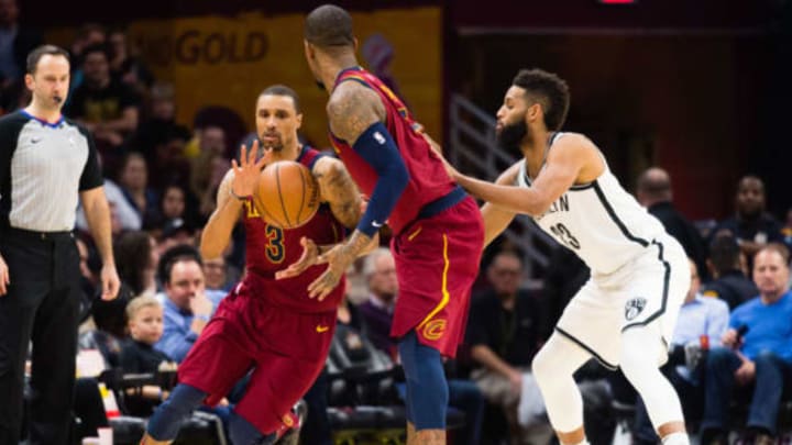 CLEVELAND, OH – FEBRUARY 27: George Hill #3 takes a pass from JR Smith #5 of the Cleveland Cavaliers while being guarded by Allen Crabbe #33 of the Brooklyn Nets during the second half at Quicken Loans Arena on February 27, 2018 in Cleveland, Ohio. The Cavaliers defeated the Nets 129-123. NOTE TO USER: User expressly acknowledges and agrees that, by downloading and or using this photograph, User is consenting to the terms and conditions of the Getty Images License Agreement. (Photo by Jason Miller/Getty Images)