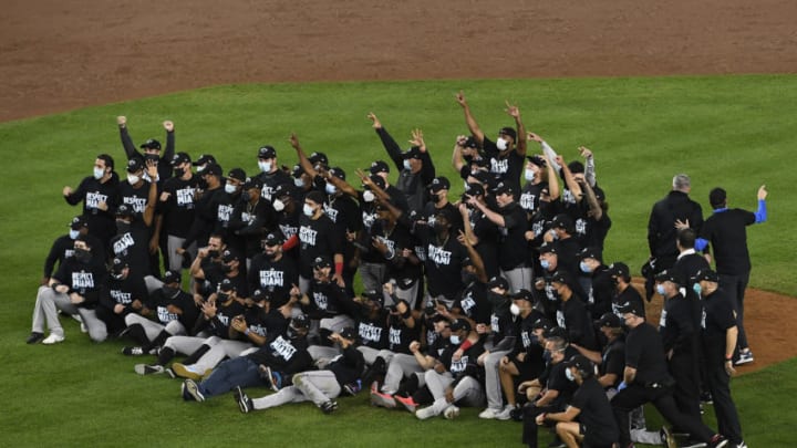 NEW YORK, NEW YORK - SEPTEMBER 25: The Miami Marlins celebrate during the tenth inning against the New York Yankees at Yankee Stadium on September 25, 2020 in the Bronx borough of New York City. The Marlins won 4-3 and clinched a playoff berth. (Photo by Sarah Stier/Getty Images)