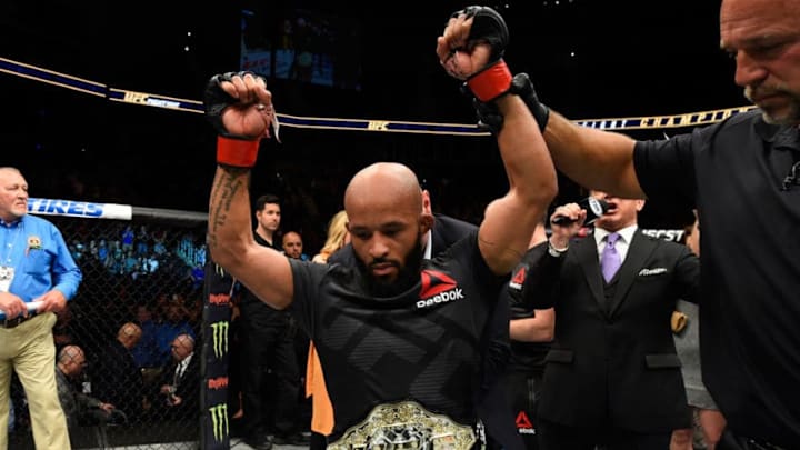 KANSAS CITY, MO - APRIL 15: Demetrious Johnson celebrates his submission victory over Wilson Reis of Brazil in their UFC flyweight fight during the UFC Fight Night event at Sprint Center on April 15, 2017 in Kansas City, Missouri. (Photo by Josh Hedges/Zuffa LLC/Zuffa LLC via Getty Images)